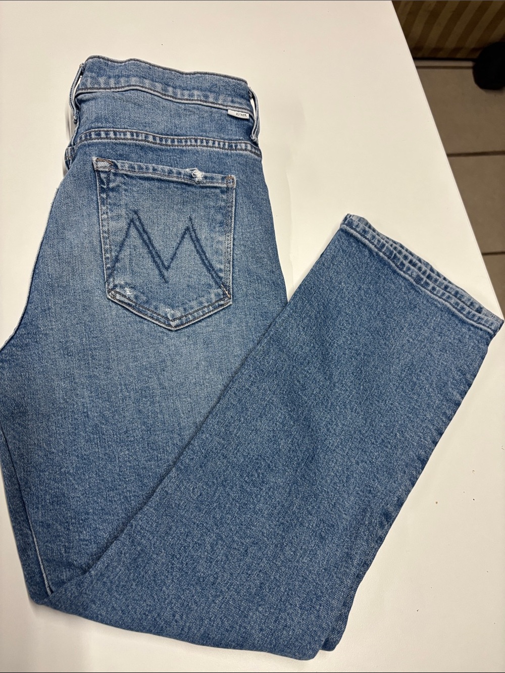 MOTHER Ankle Jeans in a classic medium blue wash.